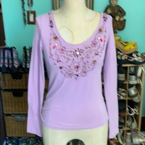 Long sleeve embellished t-shirt.